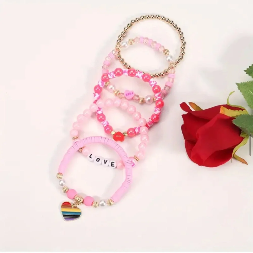NWT! Fashion Jewelry 5 pink and gold beaded stackable stretch bracelets